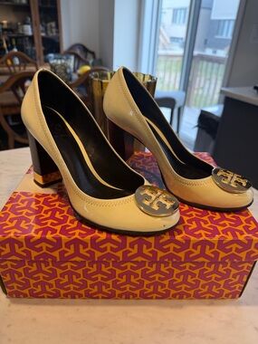 Tory Burch Cream Patent Leather Block Heel Pumps with Gold Logo Medallion